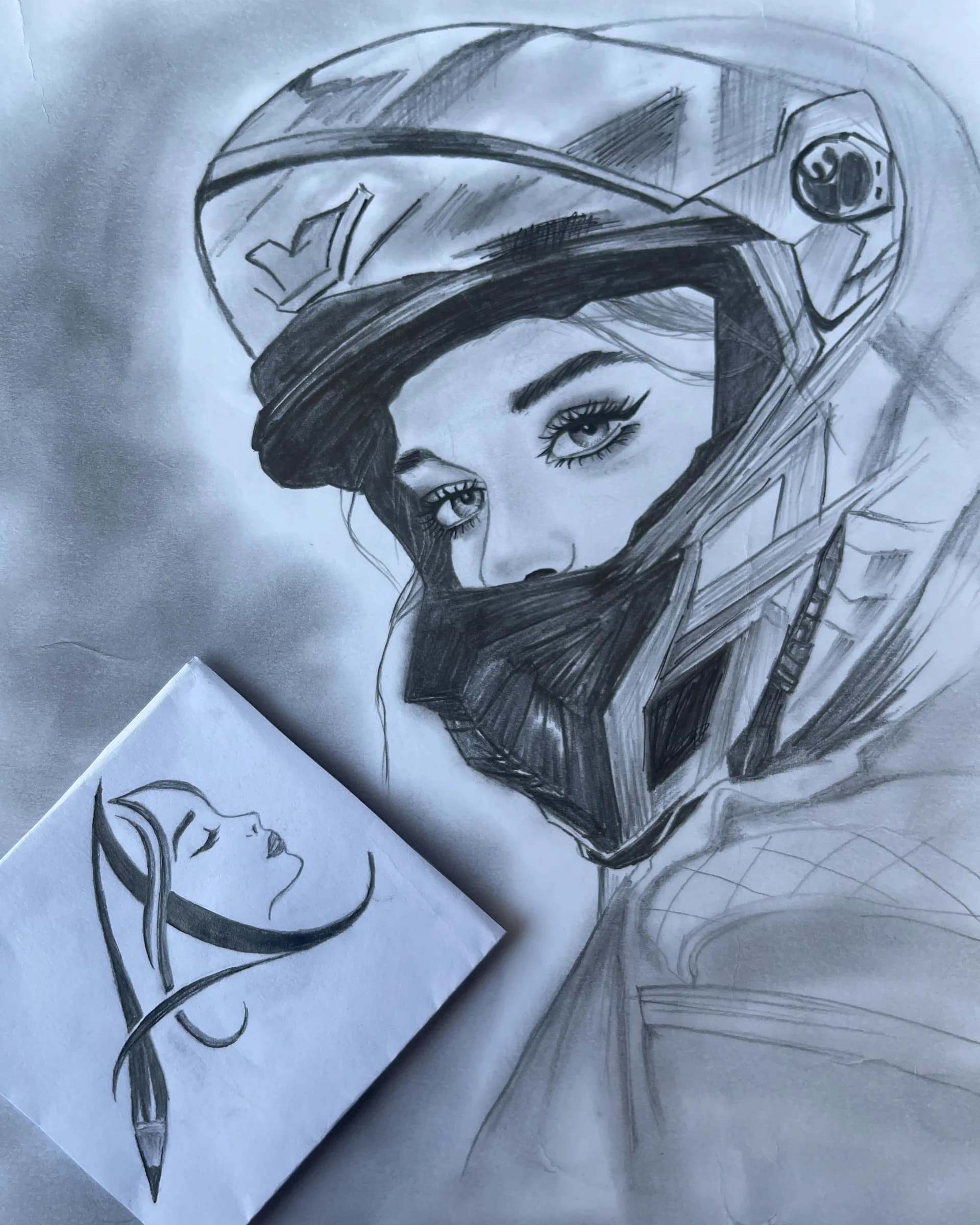 Hand-drawn graphite character portrait of a young woman wearing a detailed helmet, with expressive eyes, dark hair, and soft pencil shading by Ammama Sketch.