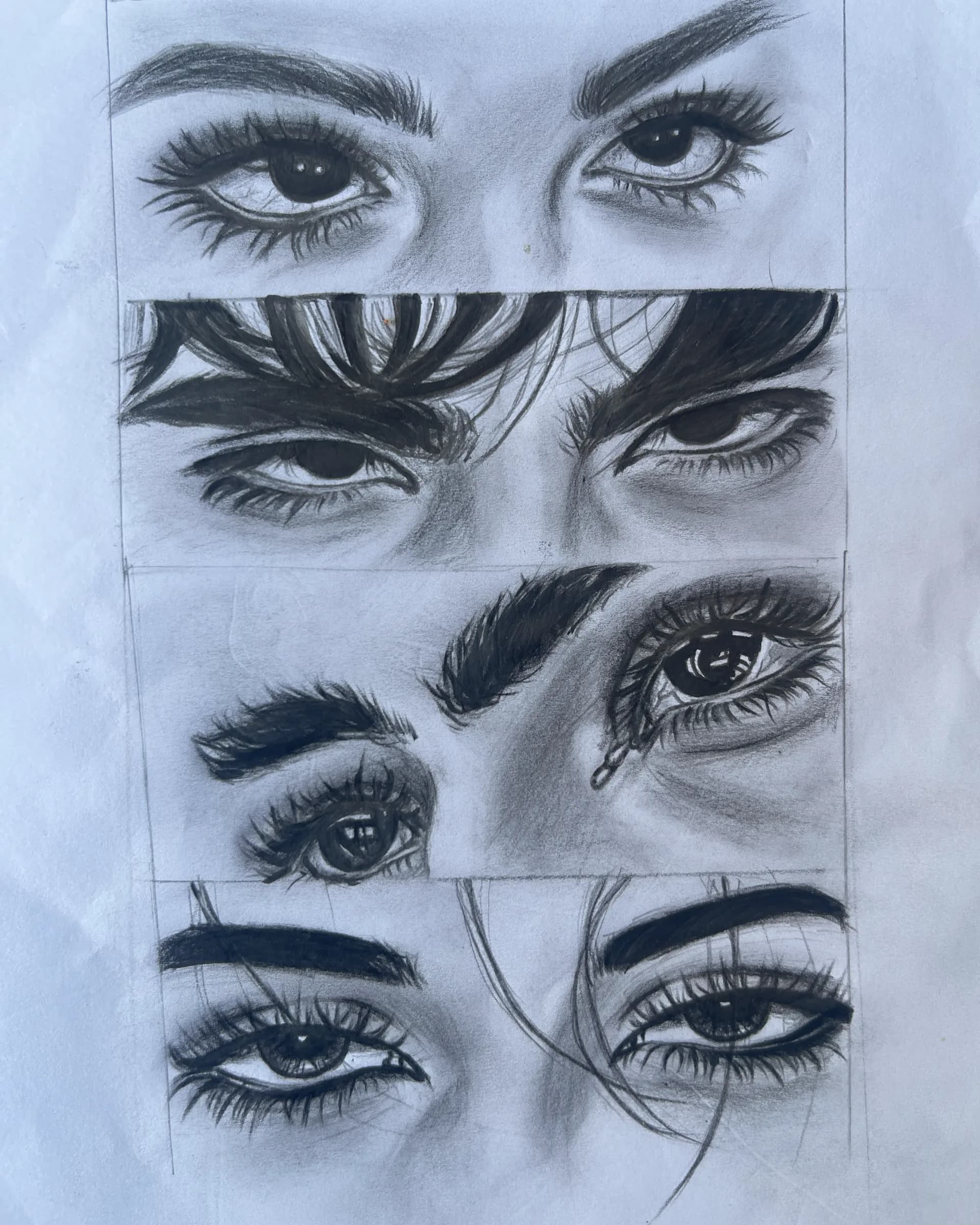 Hand-drawn graphite study featuring multiple detailed eye sketches with varied expressions, lashes, brows, shading, and tear detail by Ammama Sketch.