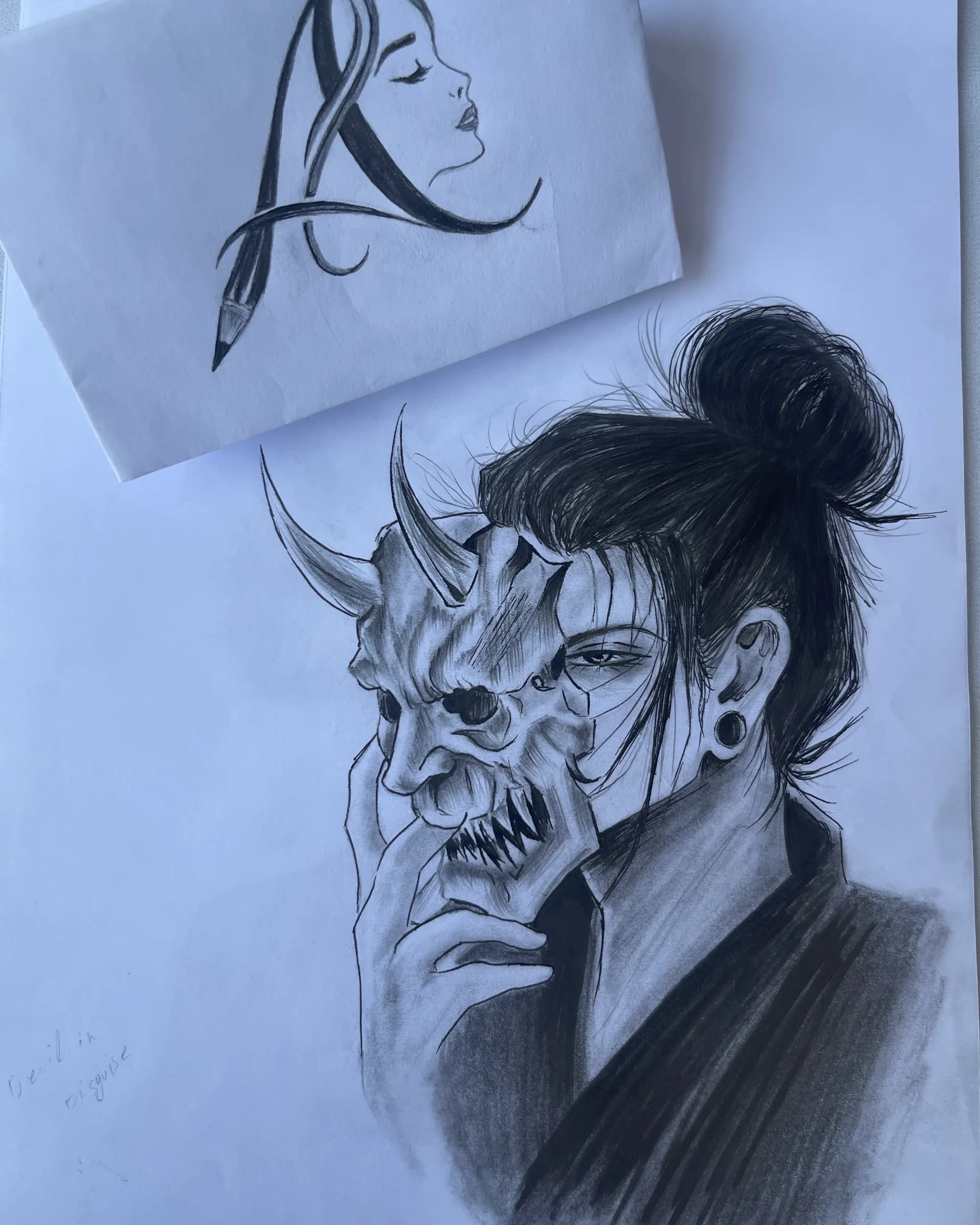 Hand-drawn graphite character artwork showing a young figure holding a dramatic skull-like mask, with detailed hair, shading, and dark tonal contrast by Ammama Sketch.